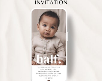 May include: A white smartphone with a photo of a baby on the screen. The text "half." is displayed in large white letters on the screen. The text "You are invited to Oliver's Half Birthday Party Saturday July 15th at 3PM 23213 Ridge Rd. Solon OH 45456 Please RSVP to Daga at 123 123 123" is displayed below the photo.