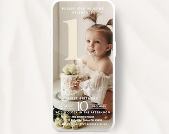 May include: An animated birthday invitation on a smartphone screen. The design features a baby with cake frosting on their face, a cake, and the text "First Birthday." Additional text includes the date, time, and location of the party. The invitation reads "Watch It."