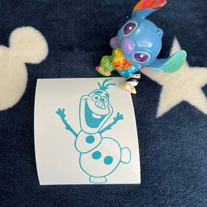 May include: A blue and white vinyl sticker featuring Olaf, the snowman from the movie Frozen. Olaf is smiling with his arms outstretched and has a carrot nose and three black buttons.