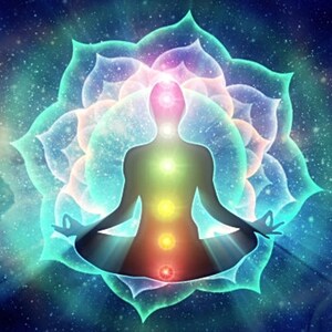 May include: A digital illustration of a person meditating, surrounded by a glowing lotus flower and a starry background. The person's body is highlighted with the colors of the chakras, from red at the base to violet at the crown.