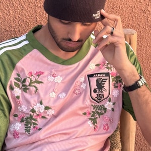 Japan x nigo football shirt in pink with custom floral cherry blossom embroidery