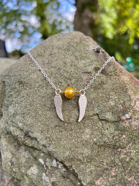 Snitch necklace shop