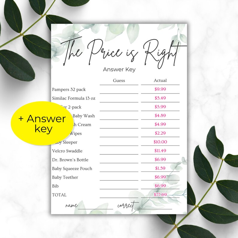 Green leaves on a white marble countertop. Baby shower The Price Is Right answer key 5x7 printout on the counter with yellow circle over the sheet saying "+ answer key"