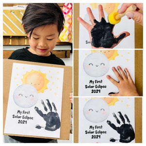 May include: A child's handprint art project depicting a solar eclipse. The artwork features a yellow sun, a white moon with a black handprint representing the eclipse, and the text "My First Solar Eclipse 2024".