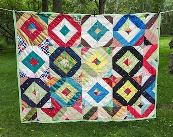 Quirky vintage satin quilt