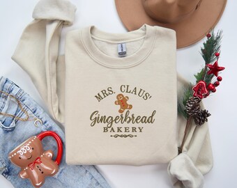 Mrs. Claus’ Gingerbread Bakery Embroidered Christmas Sweater | Festive Holiday Sweatshirt with Gingerbread Design | Cozy Cotton-Poly Blend