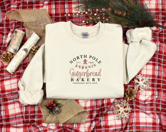North Pole Gingerbread Bakery Embroidered Christmas Sweater | Cute Holiday Sweatshirt with Gingerbread Design | Festive Christmas Pullover |