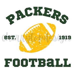 May include: A graphic design featuring the word "PACKERS" in dark green above a yellow and white football. Below the football, the word "FOOTBALL" is in dark green. The text "est. 1919" is also included.