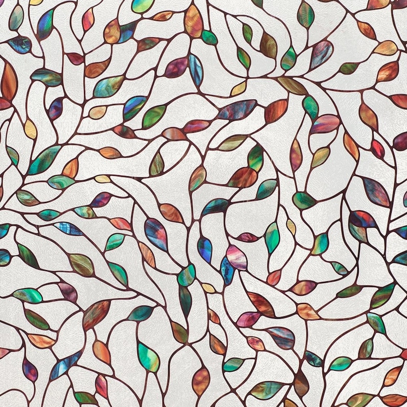 May include: A stained glass window film with a pattern of colorful leaves and branches. The film is designed to add privacy and style to any window.