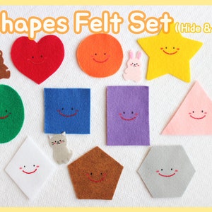 May include: A colorful felt set with various shapes, including a heart, circle, square, and star, each with a smiling face. The set also includes felt animal shapes. The text "Shapes Felt Set (Hide & Seek)" is at the top.