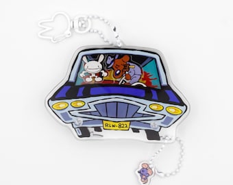 Llavero con dije de acrílico con forma de agitador de Sam & Max Desoto