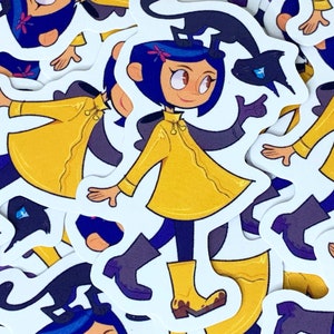 Puede incluir: Una colecci&oacute;n de pegatinas con una ni&ntilde;a de dibujos animados con impermeable y botas amarillas, con un gato negro. La ni&ntilde;a tiene el pelo azul y est&aacute; sonriendo. Las pegatinas son blancas.