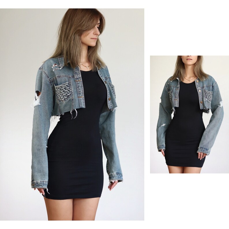 May include: A cropped denim jacket with distressed details and a braided pocket design. The jacket is worn over a black fitted dress.