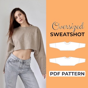 Puede incluir: Una sudadera corta y beige de gran tamaño con mangas largas. La imagen incluye el texto "Oversized SWEATSHOT" y "PDF PATTERN" sobre un fondo naranja, junto con un diagrama de la sudadera.