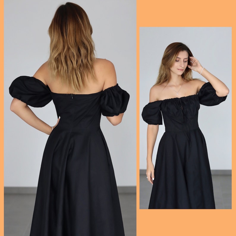 May include: A black off-the-shoulder dress with short, puffed sleeves and a fitted bodice. The dress has a full skirt and a zipper closure in the back. The dress is shown from the front and back.