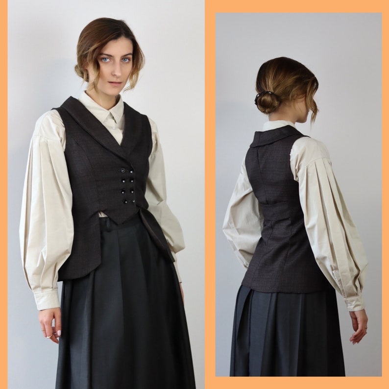 May include: A black and white patterned waistcoat with a notched collar and a button fastening. The waistcoat has a fitted silhouette and is worn over a white blouse with puffed sleeves. The model is wearing a black skirt.