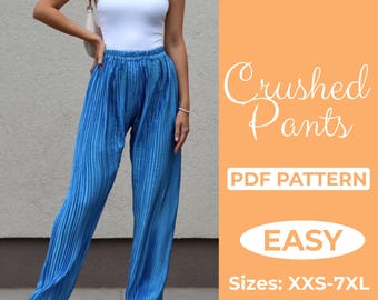 May include: Blue crushed pants with vertical pleats. The pants are paired with a white halter top. The image includes the text "Crushed Pants", "PDF Pattern", and "EASY". Sizes available are XXS-7XL.