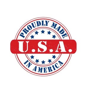 May include: A circular emblem with the text "PROUDLY MADE IN AMERICA" in a blue ring around the edge. The center features a red rectangle with "U.S.A." in white. Blue stars are interspersed.