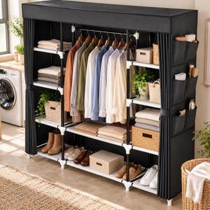 May include: A black portable wardrobe with a fabric cover, featuring a central hanging rod for shirts, multiple white shelves for folded clothing, and side storage pockets. The unit includes a frame with white connectors and black fabric curtains.
