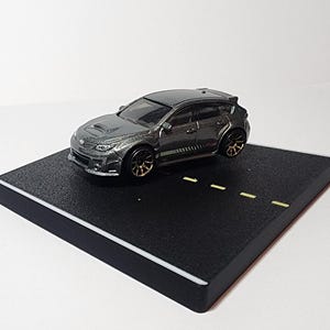 Plataforma para derrapar en el tablero de Hot Wheels con SUBARU WRX