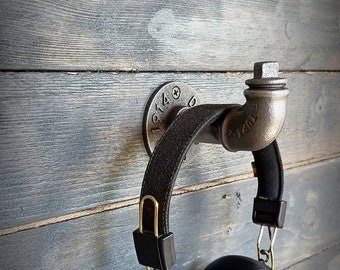 Wall-mounted industrial audio headphone support. Industrial hook, vintage hi-fi, vinyls, CDs, music, gaming headphones