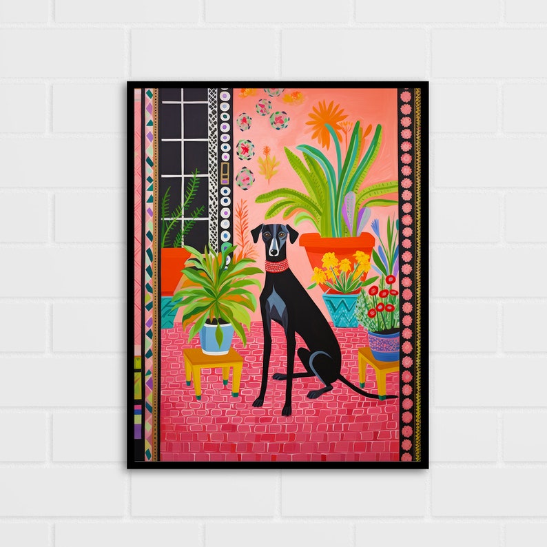 May include: A black dog with an orange collar sits in a room with pink tile floors and potted plants. The plants are in various colors, including green, orange, yellow, and red. The room has a black and white window in the background.