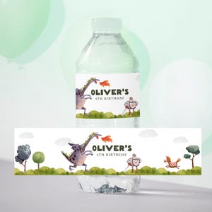 May include: A clear plastic water bottle with a custom label featuring a purple dragon breathing fire. The label reads "OLIVER'S 4TH BIRTHDAY" with a knight illustration. The design includes green grass and trees.