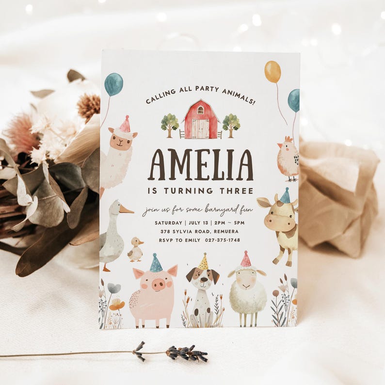 May include: A party invitation with a barnyard theme. The invitation features illustrations of farm animals, balloons, and a red barn. The text reads "Amelia is turning three" and includes party details.