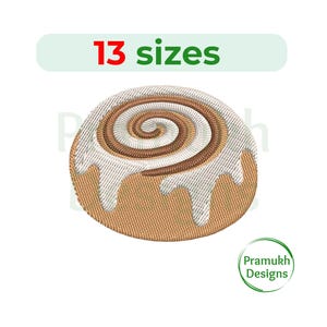 May include: An embroidered cinnamon roll with white icing dripping down the sides. The text "13 sizes" is above the roll, and the "Pramukh Designs" logo is in the lower right corner. The design is on a white background.