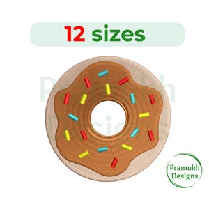 Könnte beinhalten: Ein brauner und weißer Donut mit bunten Streuseln. Der Donut ist ein digitales Stickmuster, das in 12 Größen erhältlich ist.
