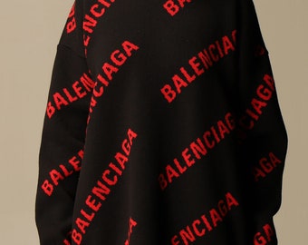 red and black balenciaga sweater