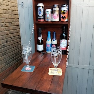 Fantastic Arty's Backyard bar made from reclaimed pallet wood, upcycled, recycled, rustic.