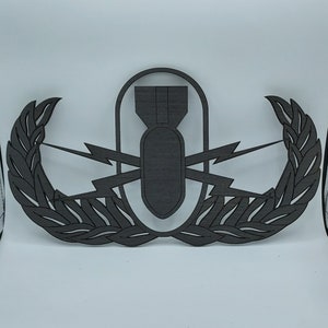 EOD-muurdecoratie krabhout, bord bomopruiming