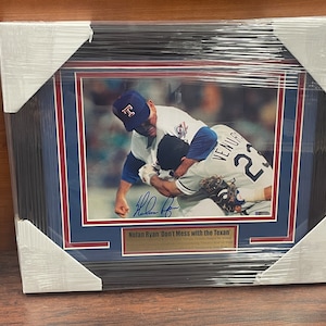 Nolan Ryan Autographed and Framed Rainbow Sleeves Jersey