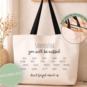May include: A white canvas tote bag with black handles. The bag features the text "SAMANTHA you will be missed" and a list of names. A circular graphic reads "PERSONALIZED". A smaller inset shows the bag's interior with a zipper and pocket.