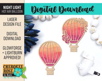 May include: Two laser cut hot air balloon night light designs with a watercolor gradient in shades of pink and orange. The balloons are decorated with floral details. The text "Digital Download" is displayed at the top of the image.