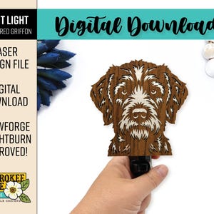 May include: A laser-cut wooden night light featuring a Wirehaired Griffon dog portrait. The design includes text: NIGHT LIGHT WIREHAIRED GRIFFON, DIGITAL DOWNLOAD, LASER DESIGN FILE, GLOWFORGE + LIGHTBURN APPROVED, and CHEROKEE ROSE BY KATIE LASER FILE DESIGNS.