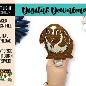 May include: A wooden night light featuring an English Lop rabbit design. The rabbit is brown with white accents and is held in a hand. The image includes text that says "Digital Download" and "Laser Design File".