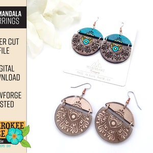 May include: Laser cut file for a pair of eye mandala earrings. The earrings are made of wood and have a teal and brown color scheme. The file is for use with a Glowforge.