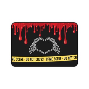 May include: Black and yellow crime scene tape with the text "Crime Scene - Do Not Cross" and two white skeleton hands forming a heart shape against a black background with red blood dripping from the top.