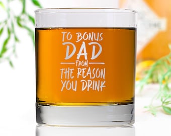 May include: A clear glass tumbler with the text "To Bonus Dad from The Reason You Drink" etched on the side.