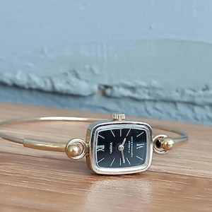 RARE Vintage Women's Watch "Chaika" Gold Wristwatch for Women. Miniature mechanical watch with a beautiful black dial.