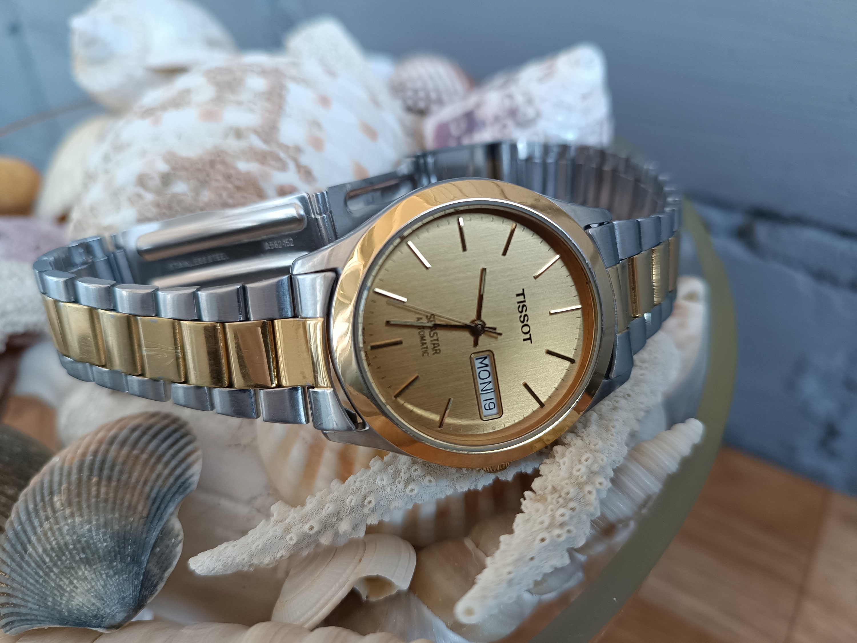 Tissot seastar shop automatic gold