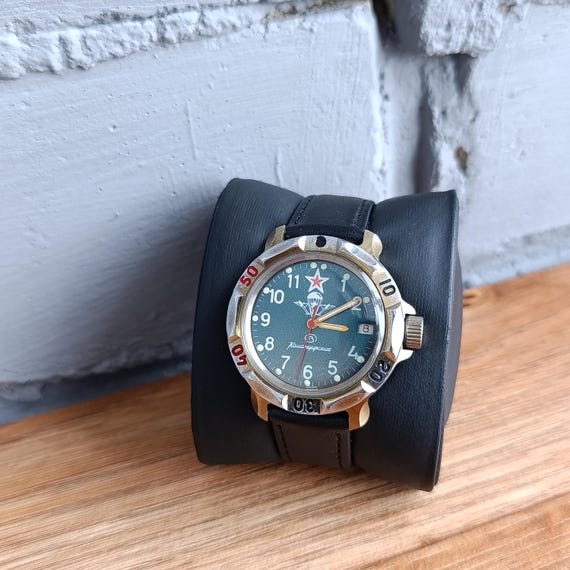 Vintage men's watches. "Vostok" watches. Mechanical military watches with a calendar. "Vostok Commander" wristwatch with a beautiful dial.