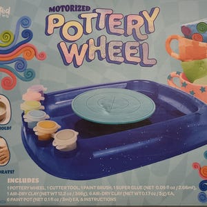 May include: A blue motorized pottery wheel kit for ages 6+. The box includes a pottery wheel, cutter tool, paint brush, glue, air-dry clay, and paint pots. The box features the words "Motorized Pottery Wheel" and images of finished pottery.