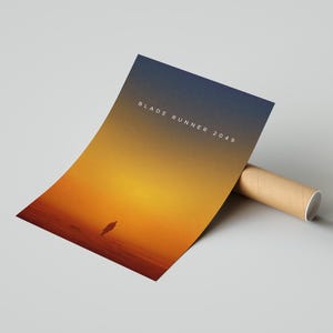 May include: A poster for the movie "Blade Runner 2049" with a gradient background of blue, orange, and yellow. The title of the movie is printed in white text on the poster. A silhouette of a person is walking in the distance.