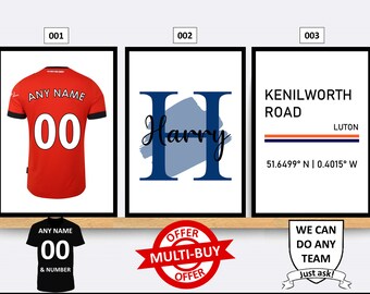 May include: Three framed prints with different designs. The first print features a red soccer jersey with the text "ANY NAME" and the number "00". The second print features a blue letter "H" with the text "Harry" in a cursive font. The third print features the text "KENILWORTH ROAD" in black with the text "LUTON" in white and the coordinates "51.6499° N | 0.4015° W" in black.
