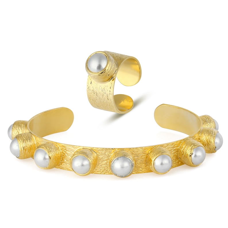 May include: A gold-toned bracelet and ring set with faux pearl accents. The bracelet has a textured finish and features a row of pearls around the band. The ring is also textured and has a single pearl on the top.