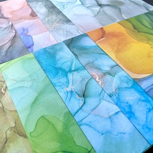 Bastelpapier von Craft Consortium - Alcohol Ink - 10 Stück - 15 x 15 cm - Naturfarben - Gelb / Blau / Grün / Braun
