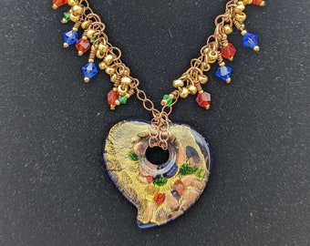 Blue gold green and red glass heart pendant on copper chain with toggle clasp and earrings